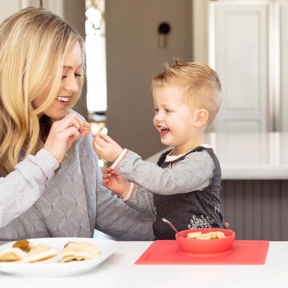 ezpz Happy Bowl - 24 Months   (Coral) - 100% Silicone Suction Bowl with Built-in Placemat  Dishwasher Safe