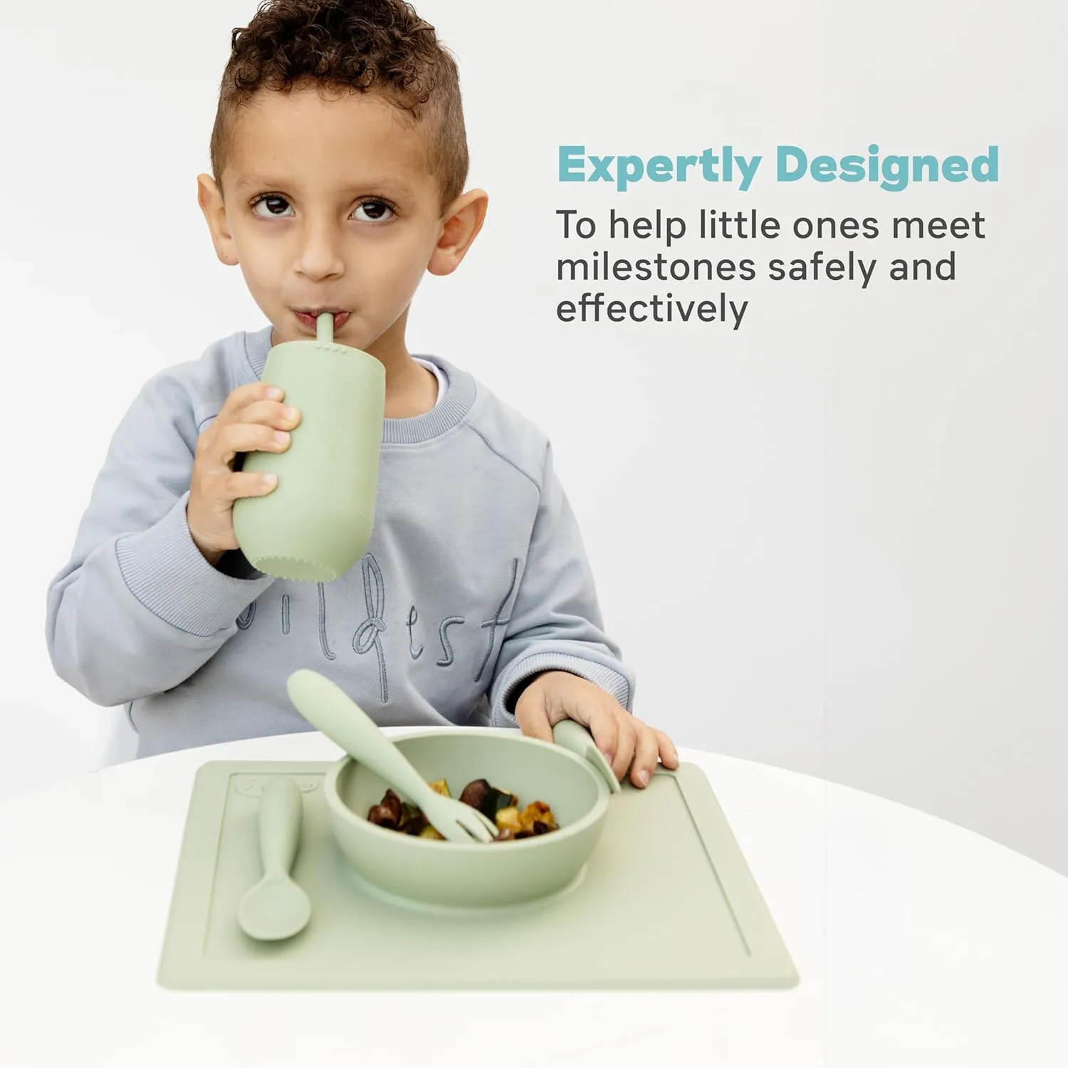 ezpz Happy Bowl - 24 Months   (Sage) - 100% Silicone Suction Bowl with Built-in Placemat  Dishwasher Safe